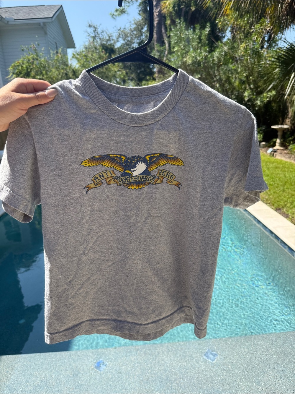Boys, gray anti-hero skateboard shirt size small